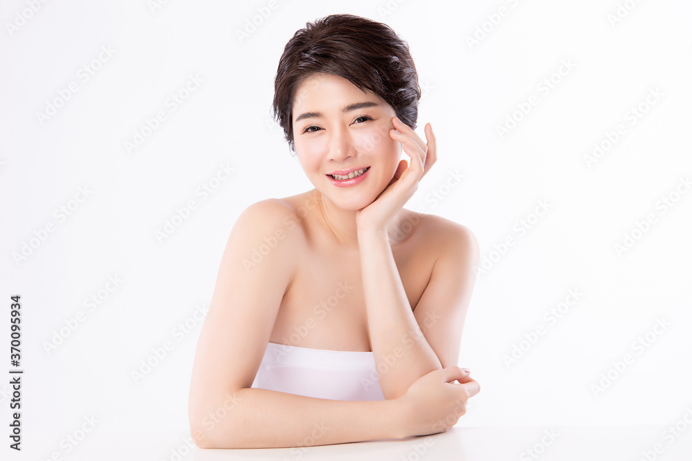Beautiful Young asian Woman with Clean Fresh Skin, on white background, Face care, Facial treatment, Cosmetology, beauty and spa, Asian women portrait Beautiful Young asian Woman with Clean Fresh Skin, on white background, Face care, Facial treatment, Cosmetology, beauty and spa, Asian women portrait