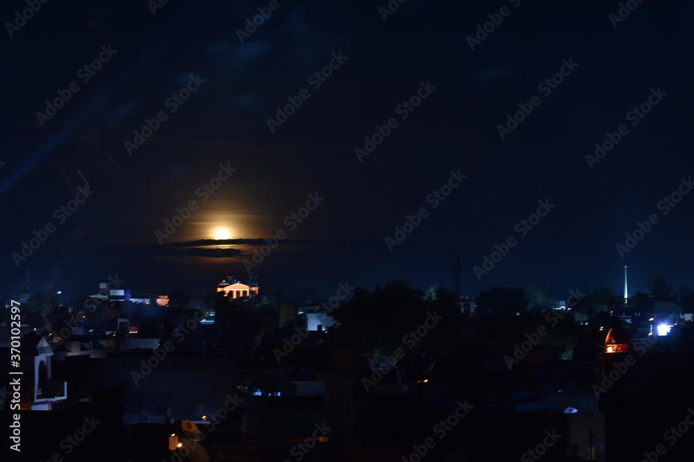 beautiful full moon in the city in India 