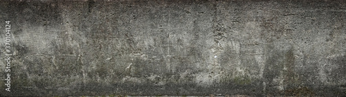 ひび割れのある古いコンクリートの壁の背景テクスチャー