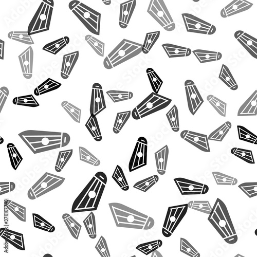 Black Musical instrument kankles icon isolated seamless pattern on white background. Vector.