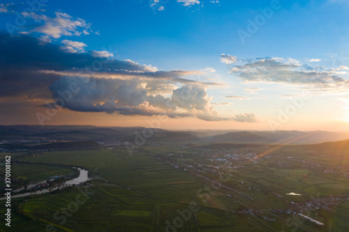 Aerial view of the Somesul river shore in summer, Dej, Romania photo