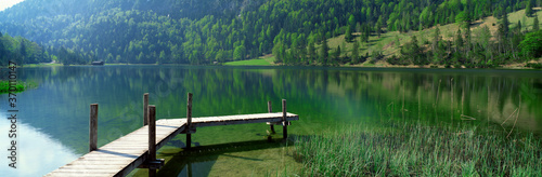 beautiful lake with dock, lake in the forest and dock