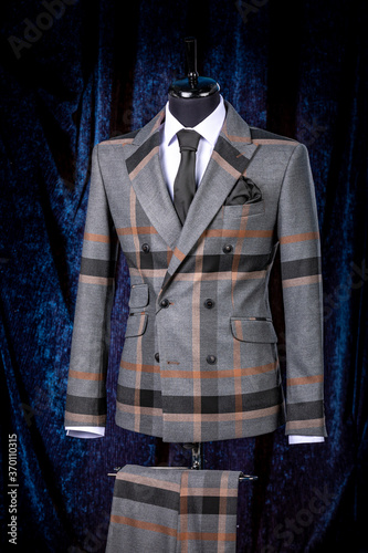 Wallpaper Mural Stylish men's gray check suit on a mannequin or dummy. Men's Clothing. Clothing store. Shopping in boutiques Torontodigital.ca