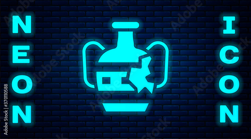 Glowing neon Broken ancient amphorae icon isolated on brick wall background. Vector.