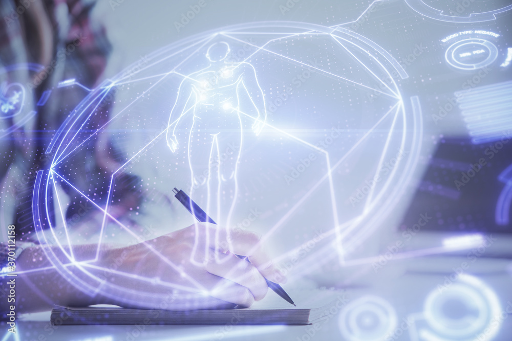 Naklejka premium Education theme hologram over woman's hands writing background. Concept of study. Double exposure