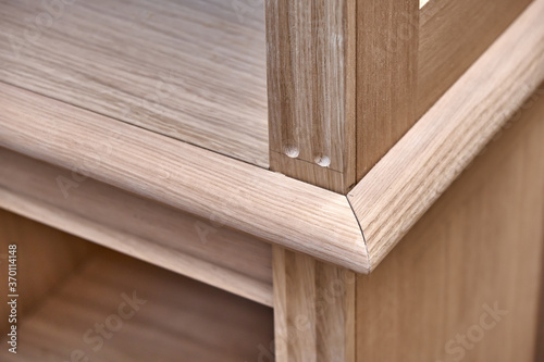 Modern joinery. Wooden bookcases in process of production in workshop. Furniture manufacture