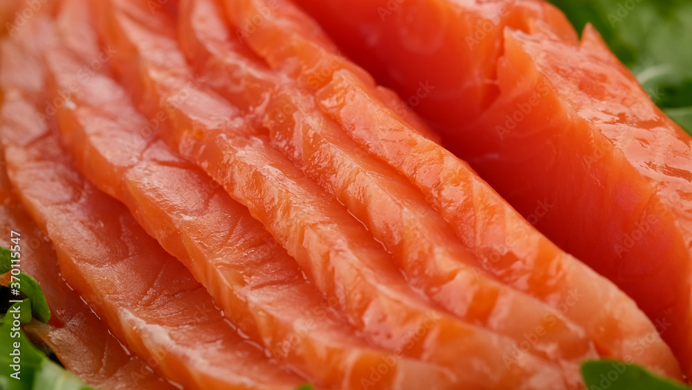 sliced fresh salmon rotating close up
