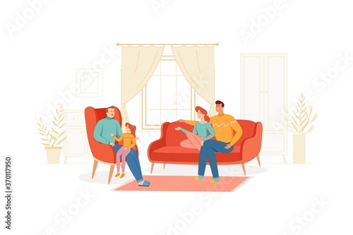 The family spends time together in a cozy living room
