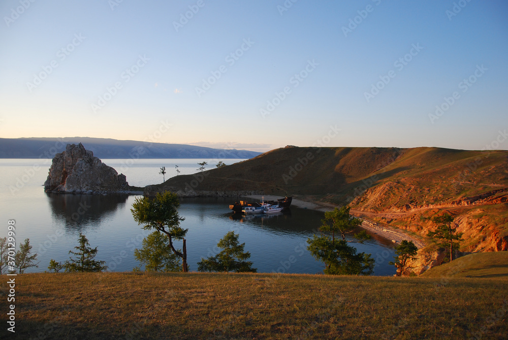 Beautiful nature. Landscape in Siberia. Lake Baikal, water and rocky shore. Nature in summer 