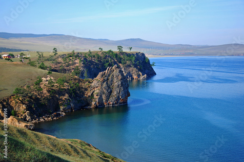 Beautiful nature. Landscape in Siberia. Lake Baikal, water and rocky shore. Nature in summer