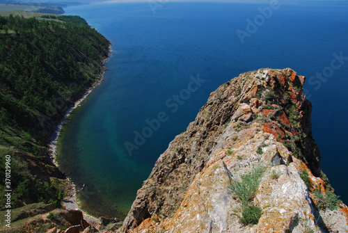 Beautiful nature. Landscape in Siberia. Lake Baikal, water and rocky shore. Nature in summer