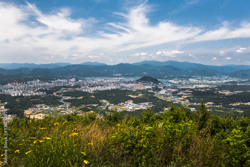 Fototapeta premium Beautiful panorama mountain and city background blue sky and clouds.