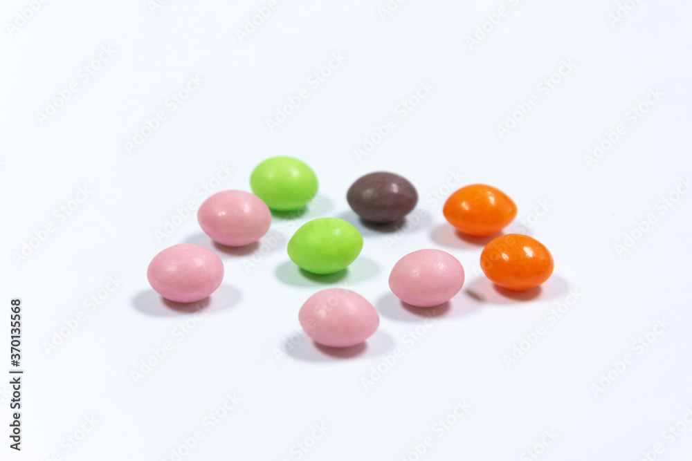 colorful candies isolated on the white background
colorful candies isolated on the white background