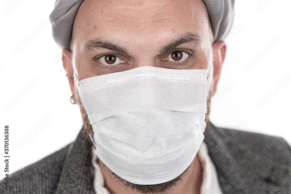 Portrait of a man wearing a coronavirus mask