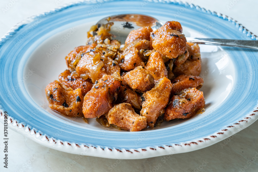 Fellah Koftesi Traditional Food. (Turkish cuisine) Polpettes From Bulgur or Bulghur and Semolina in Tomato Sauce with Parsley. Fellah Koftesi Traditional Food. (Turkish cuisine) Polpettes From Bulgur or Bulghur and Semolina in Tomato Sauce with Parsley.