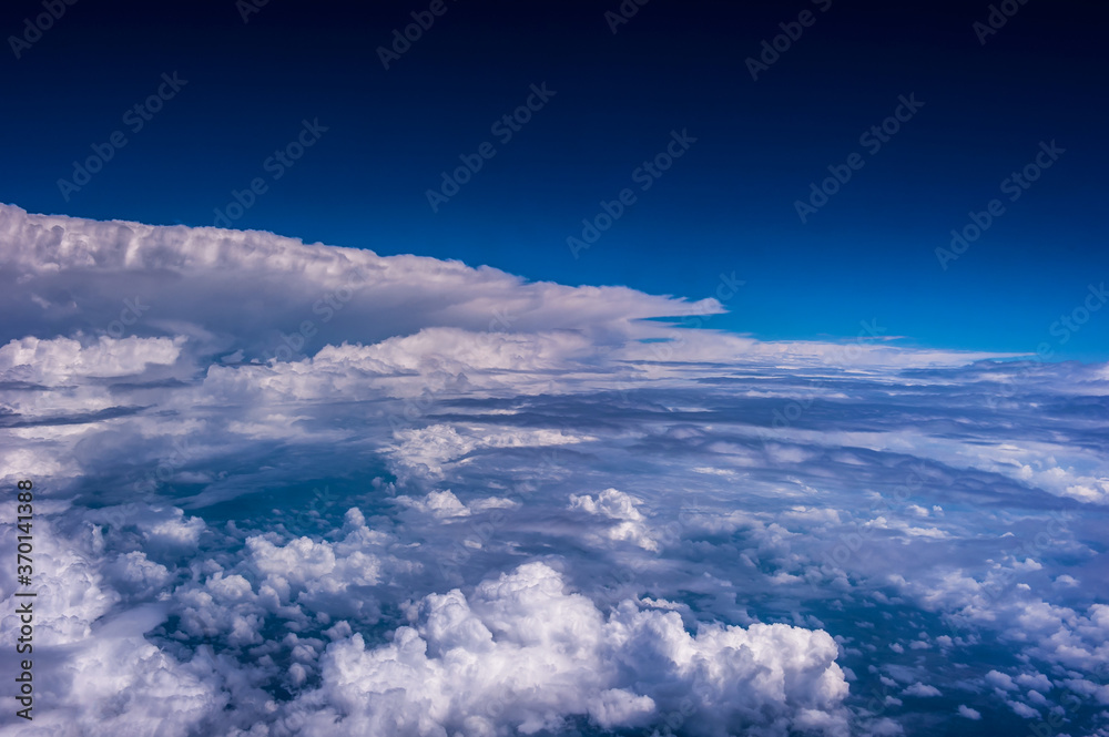 Aerial view of the fantastic and curious clouds, View on an airplane, Aerial view of the fantastic and curious clouds, View on an airplane,