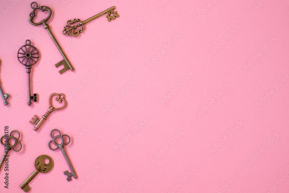 Many different old keys from different locks, scattered chaotically, flat lay. Many different old keys from different locks, scattered chaotically, flat lay.