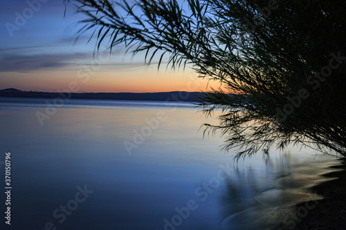 Lake Bolsena at sunset. colors, nature and a spectacular landscape