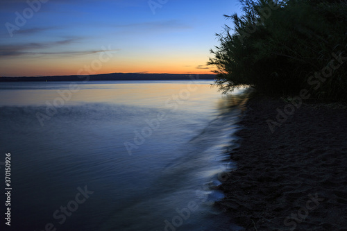 Lake Bolsena at sunset. colors  nature and a spectacular landscape