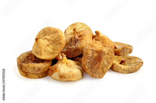 A pile of dried tasty figs isolated on white