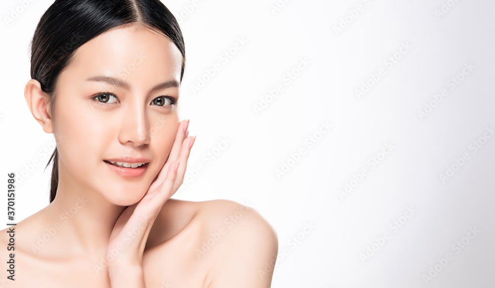Beautiful Young asian Woman with Clean Fresh Skin, on white background, Face care, Facial treatment, Cosmetology, beauty and spa, Asian women portrait Beautiful Young asian Woman with Clean Fresh Skin, on white background, Face care, Facial treatment, Cosmetology, beauty and spa, Asian women portrait