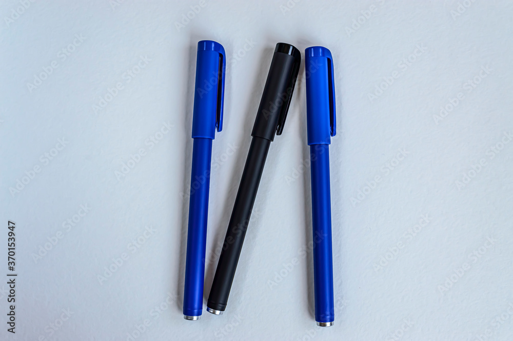 blue and black penes for writing on a white background blue and black penes for writing on a white background