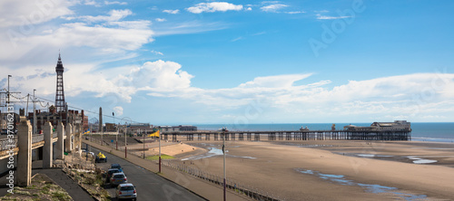View of Blackpool north shore including north and central piers with Blackpool Tower in the background, Blackpool, Lancashire, UK