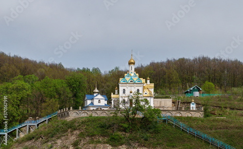 Krasnousolsk. Republic of Bashkortostan. Russia. April 24.2012. Temple of the Tabyn icon of the mother of God on a cloudy spring day photo