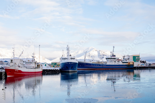 two boath Hofn Port Panorama on Winter ice beach with boat