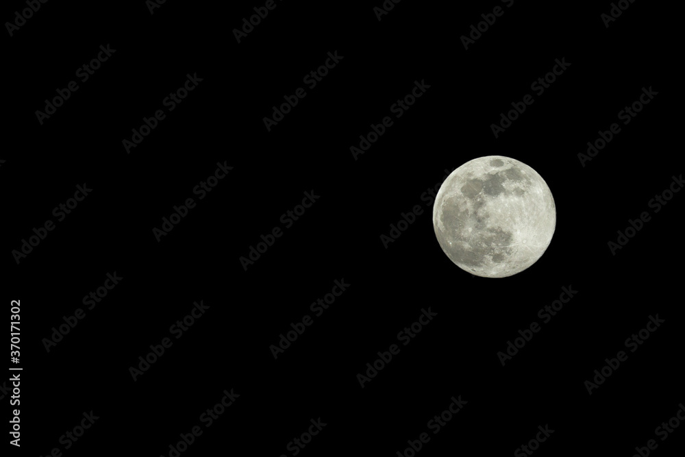 Beautiful full moon on the dark night with free text space. Beautiful full moon on the dark night with free text space.
