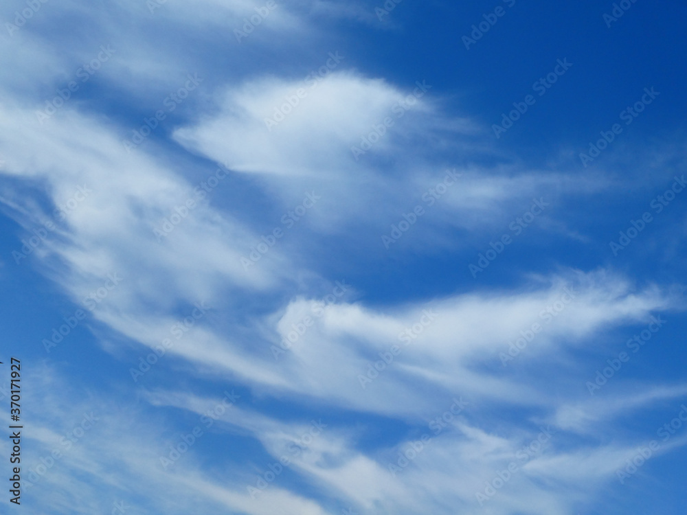 Obraz premium The blue sky with white clouds background and texture