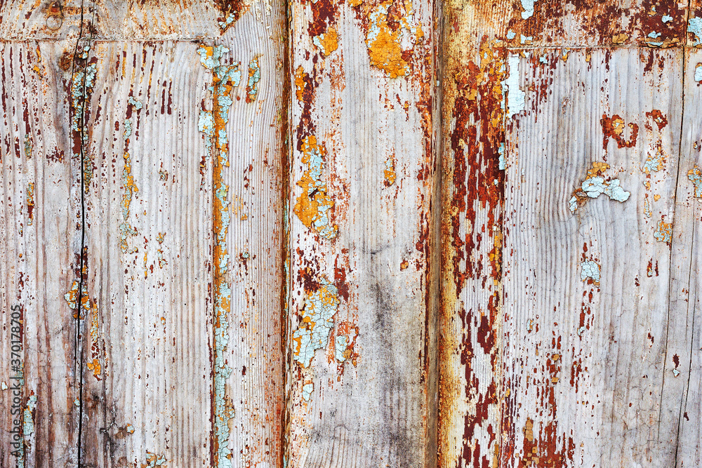 Background gloomy charred wooden fence in dark colors Background gloomy charred wooden fence in dark colors