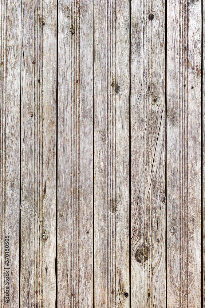 Background gloomy charred wooden fence in dark colors Background gloomy charred wooden fence in dark colors
