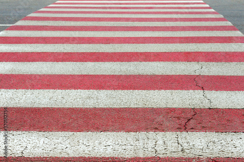 Striped crosswalk on the road in perspective with shallow depth of field © Elena