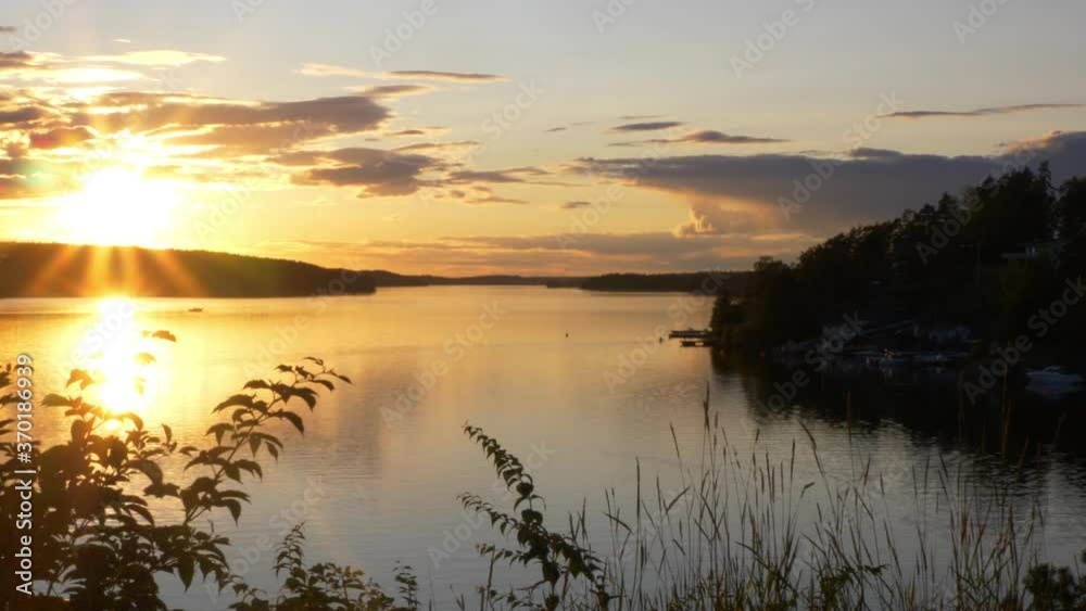 sunset over the river in Sweden sunset over the river in Sweden