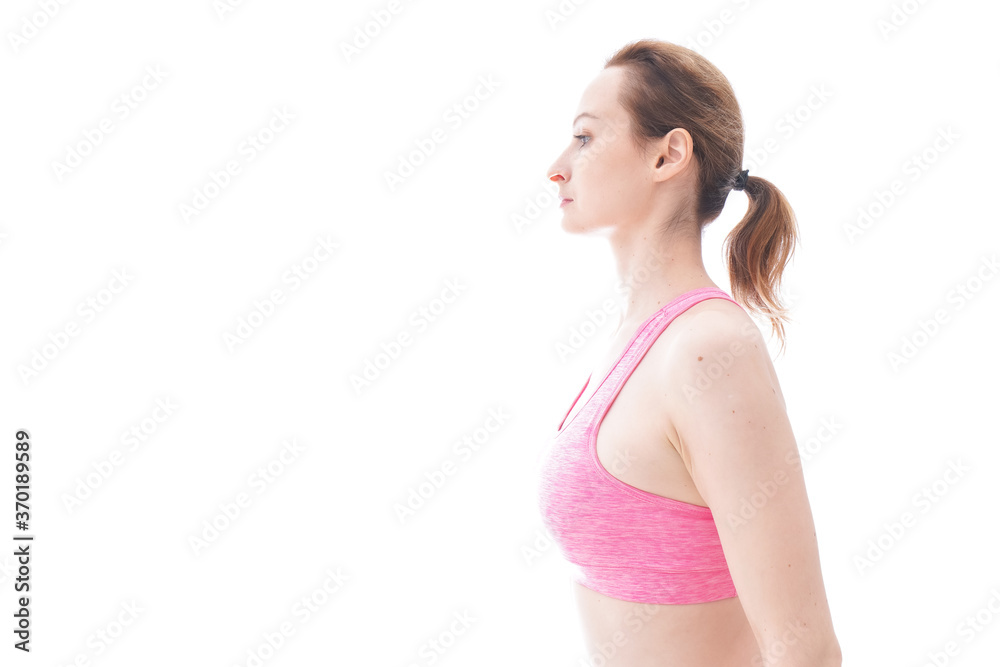 ストレッチをする笑顔の若い女性 ストレッチをする笑顔の若い女性