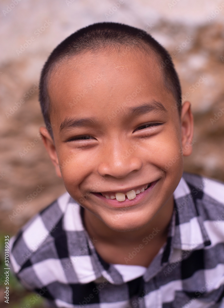 Portrait of a cute asia thai boy smiling Portrait of a cute asia thai boy smiling