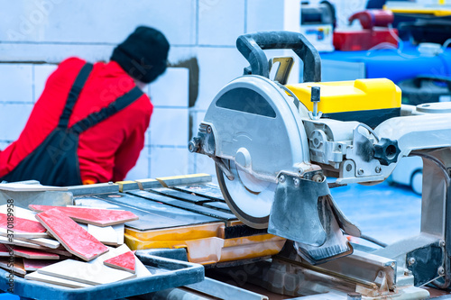 Circular saw on the backgro...