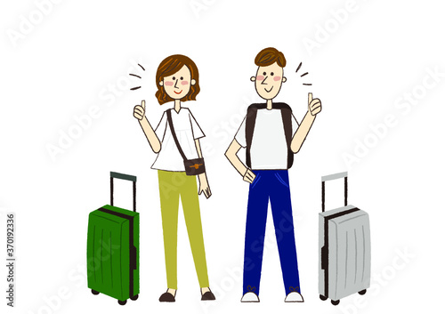 グッドポーズで旅行に行く男性と女性