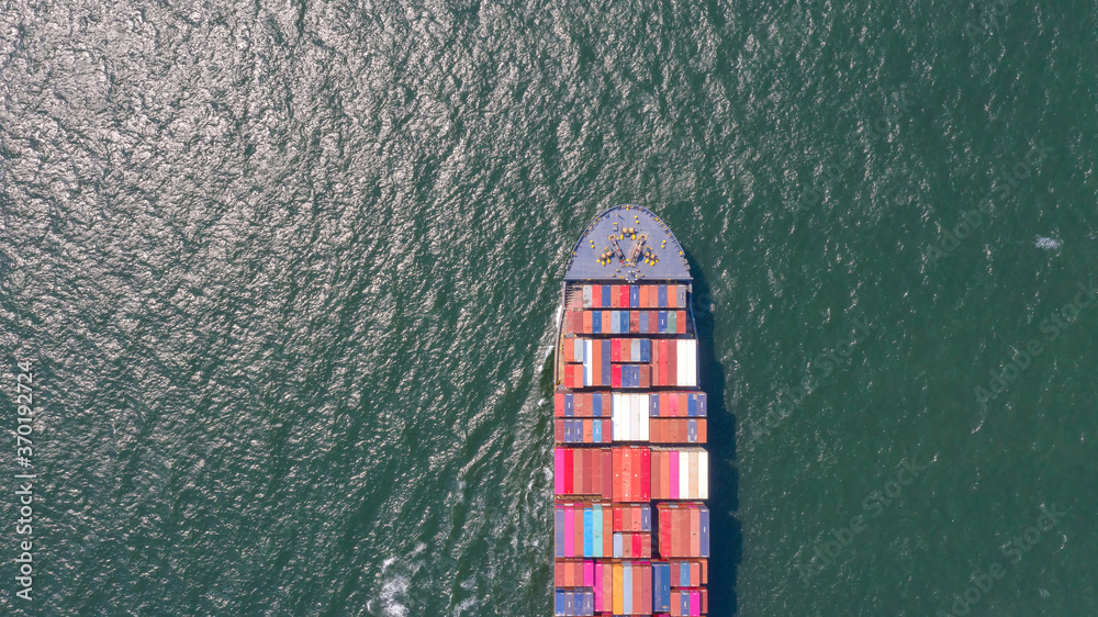 Container , container ship in export and import business and logistics. Shipping cargo to harbor by crane. Water transport International. Aerial view and top view. Container , container ship in export and import business and logistics. Shipping cargo to harbor by crane. Water transport International. Aerial view and top view.