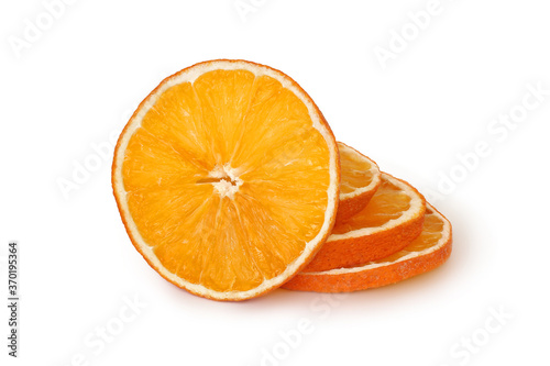 Slices of dried orange isolated on white