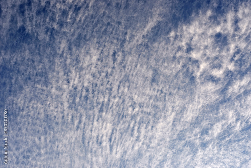 Strange clouds in blue sky