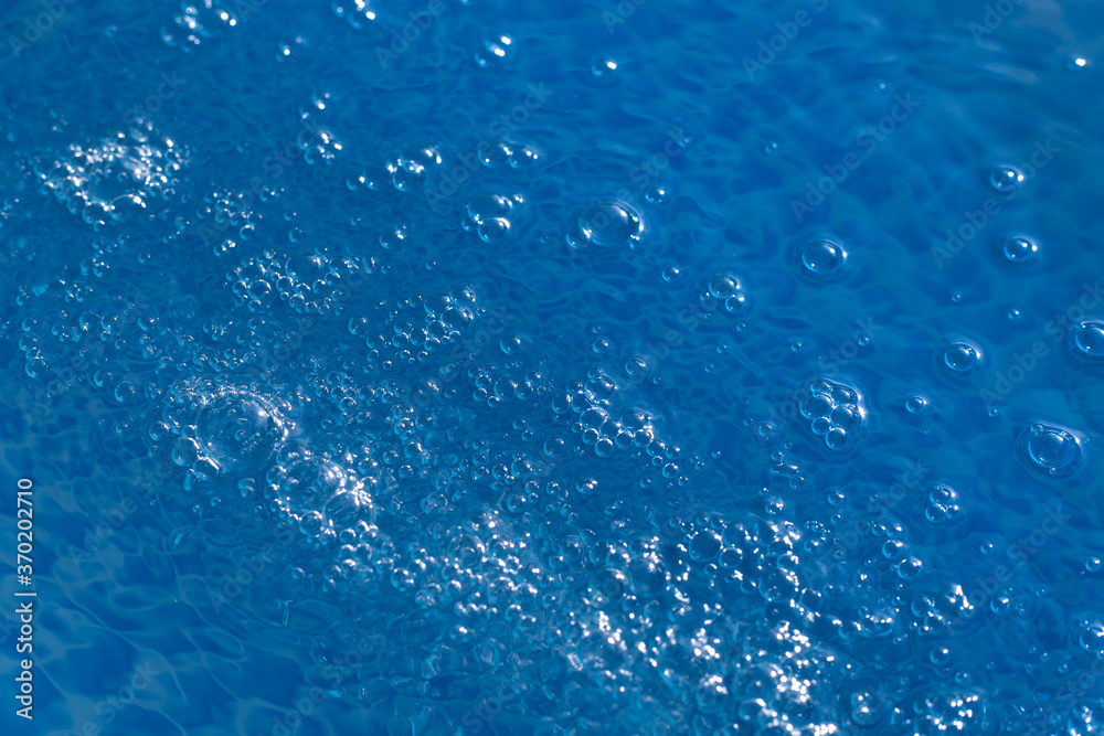 blue water with bubbles and blue drops background blue water with bubbles and blue drops background