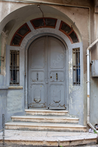 old door and window of stone building © Seluk