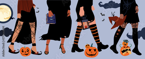 Set of four pairs female legs in fishnet stockings and boots.Halloween festival.Girls in witch costumes,black flowing dresses with torn edges,pointed hats.Hands hold attributes of the day of the dead