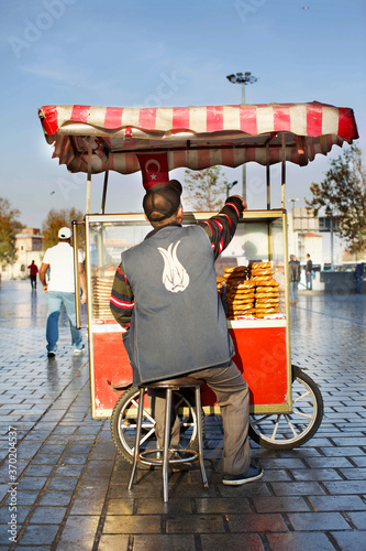 ISTANBUL,TURKEY-MARCH 27,2020:Turkish food and snack cart by public park usually sell pretzels, traditional bread and chestnuts © Seluk