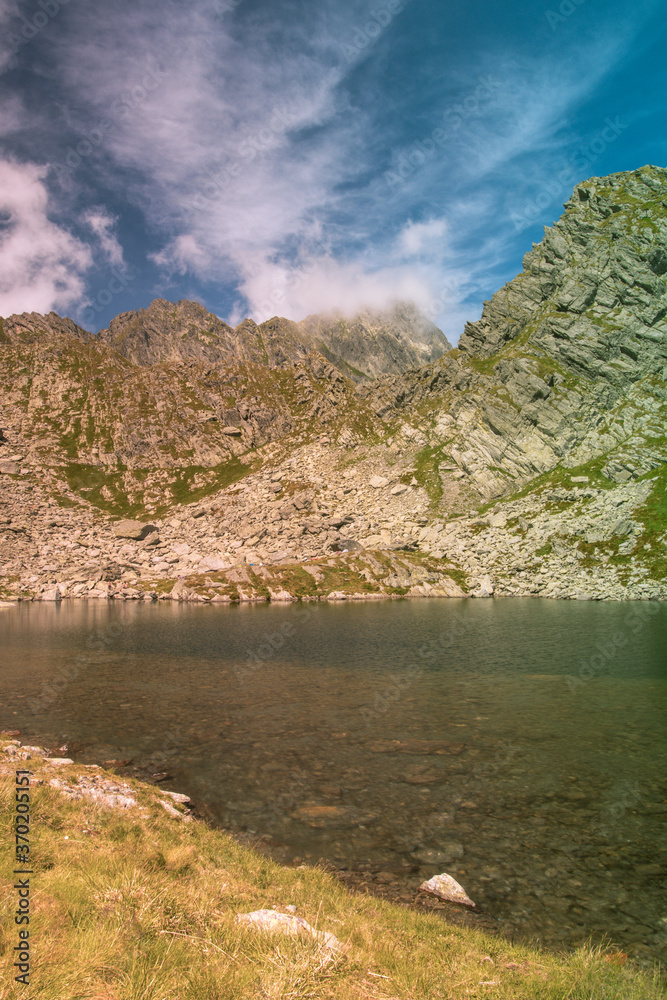 Mountain lake in the summer time hiking 