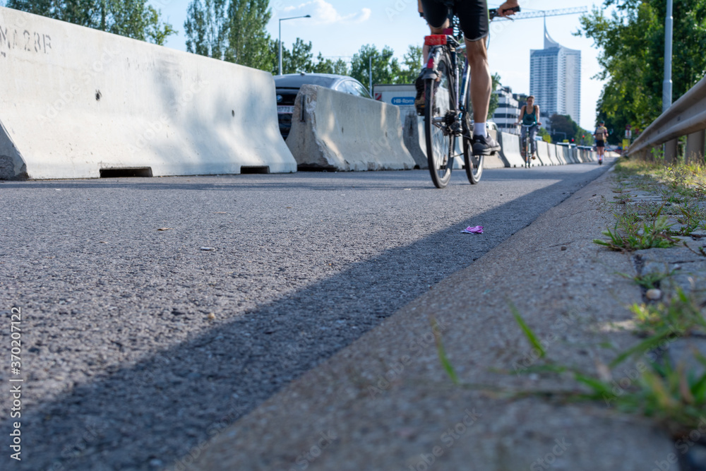 Obraz premium People are biking on a controversial so-called 