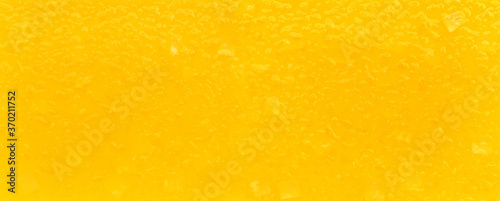 Close up orange juice or fruit drink background