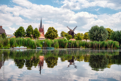 View to shore of Werder, Havel, with Holy Spirit Church -Heilig Geist Kirche- and Bock Windmill -Bockwindmühle- , Potsdam, Germany © EKH-Pictures